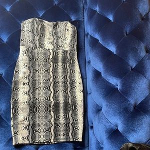 This is a lovely snake skin print mini strapless dress!